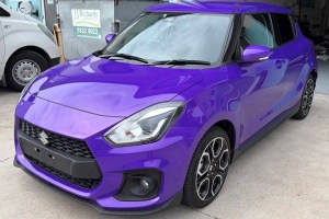 Plum burst colour change wrap on Suzuki Swift in Sydney