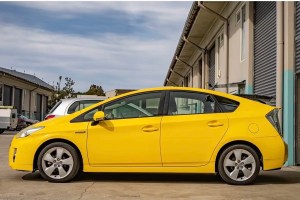 Bright yellow colour change wrap on Toyota Prius in Sydney