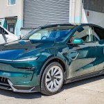 Coloured paint protection film wrap applied to a new Tesla Model Y, installed by a professional vehicle wrap specialist in Sydney.